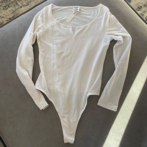 PINK \\ Ivory Long Sleeves One Piece Body Suit